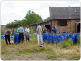 Repacking of obsolete pesticides into UN-approved drums. Palkino, Russia